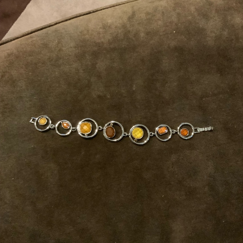 Unique Silvertone Bracelet with Neutral stones